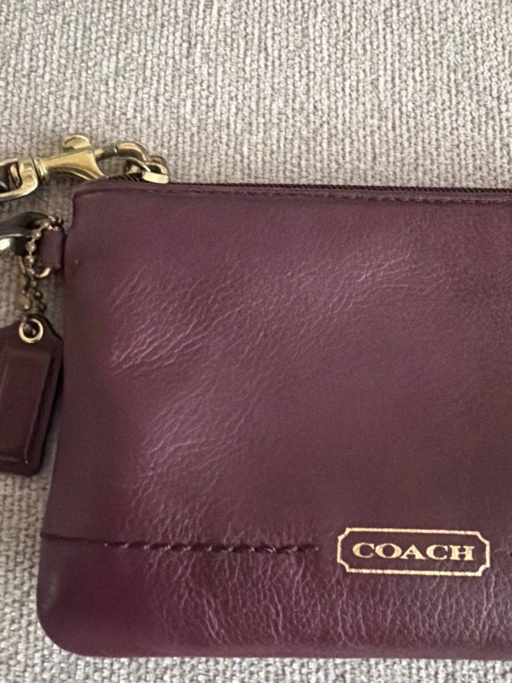 Coach Plum Leather Wristlet with Gold Hardware